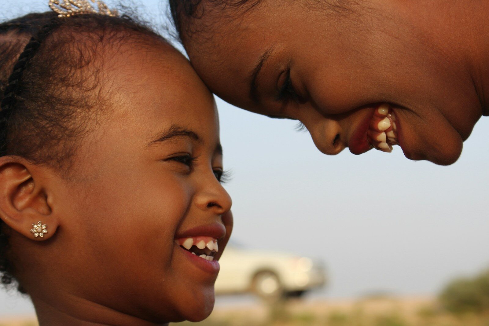 Photo by Ismail Salad Osman Hajji dirir smiling boy and girl during daytime
