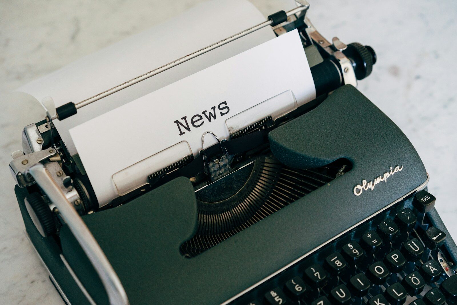 Photo by Markus Winkler a close up of an old fashioned typewriter